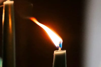 A candle going out on its own