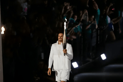 Florent Manaudou bringing the flame