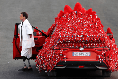 French swimmer Théo Curin arriving in the "Phryge mobile"